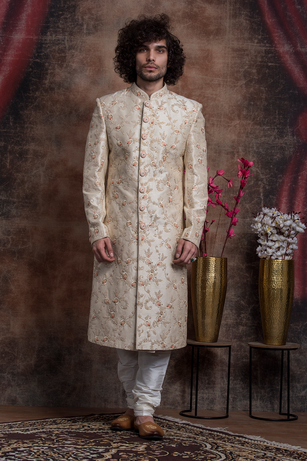 Ivory Sherwani And Churidars With Peach Hints