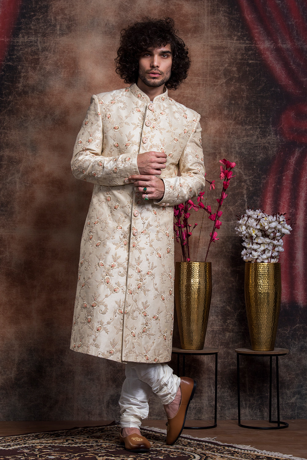 Ivory Sherwani And Churidars With Peach Hints