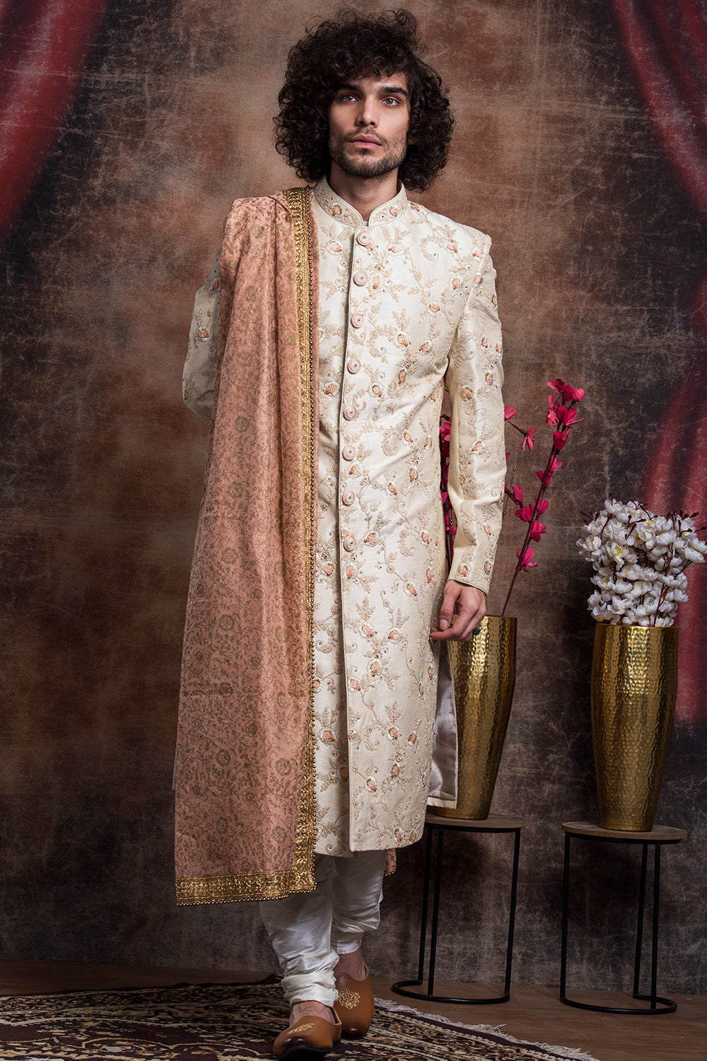 Ivory Sherwani And Churidars With Peach Hints