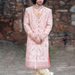 Peachish Pink Hand Embroidered Sherwani And Churidars