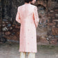 Peachish Pink Hand Embroidered Sherwani And Churidars